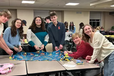 Teens helping at Junior Board Event