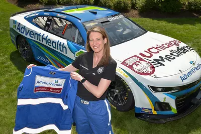 Nascar Driver Holding UChicago Medicine AdventHealth Jacket