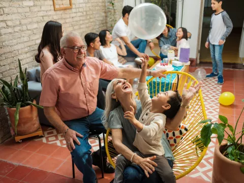 A hispanic family having a party together.