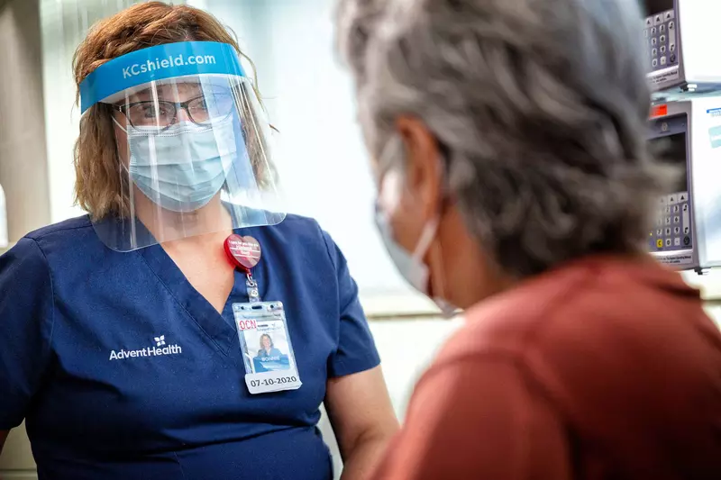 An AdventHealth nurse with a patient