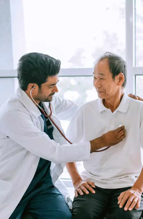 Physician Checking Patient Heart