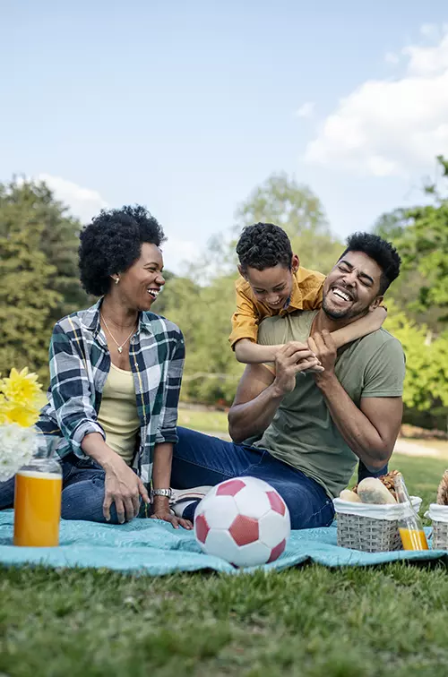 A family enjoying a picnic.